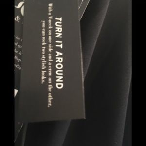 Top turn around. Could be worn either way studied